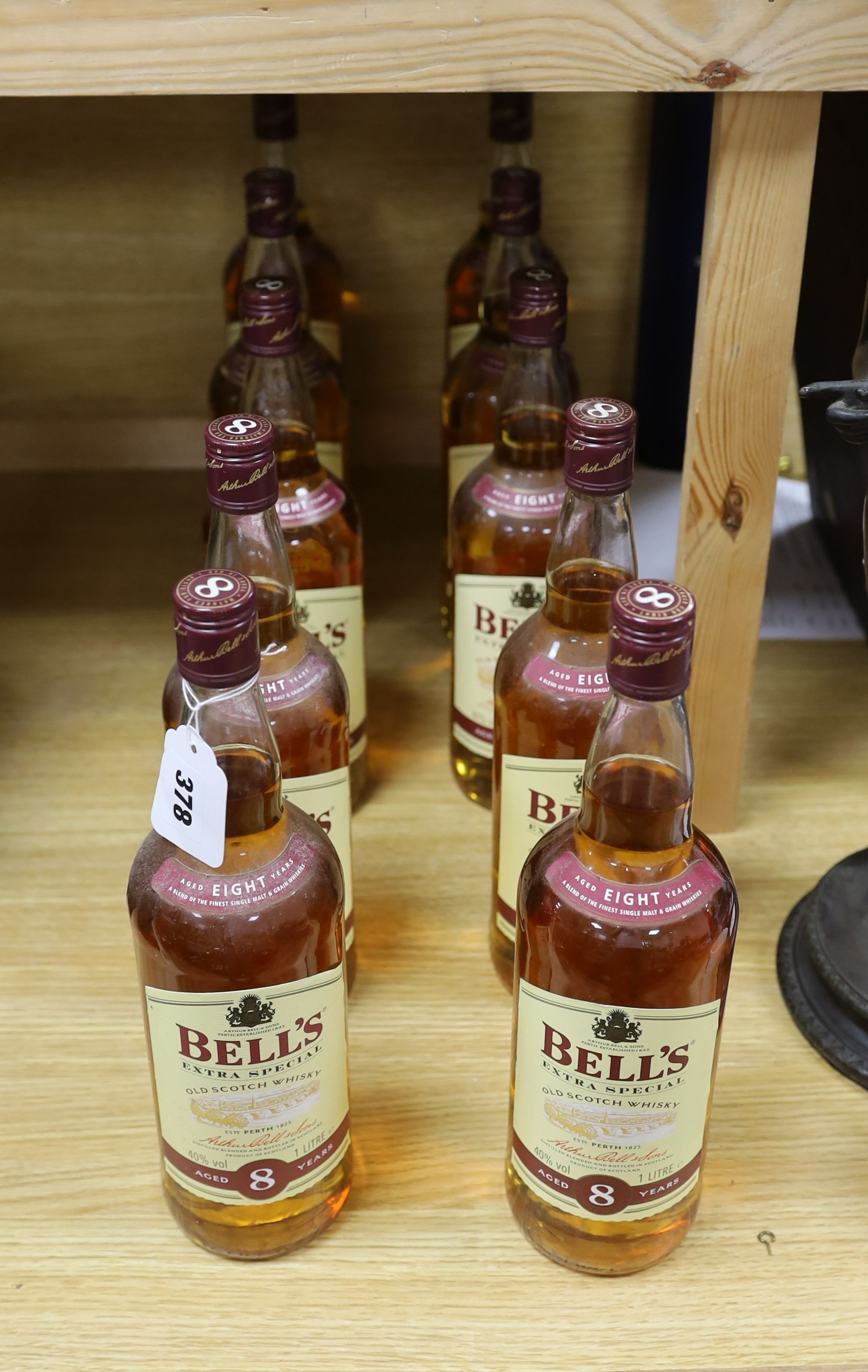 Ten litre bottles of Bells extra special scotch whisky, aged 8 years